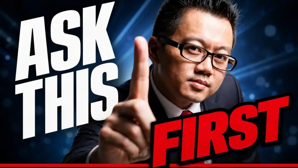Man in glasses and a dark suit holding up one finger, with bold text reading 'Ask This First' next to red 'FIRST' text - thumbnail for blog on hiring Digital Marketing Webinar Services.