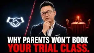 Terence Tam looking skeptical with hand on chin, split thumbnail showing a glowing neon handshake on one side and an empty candlelit dinner table for two on the other, divided by a jagged red crack — text reads "Why Parents Won't Book Your Trial Class," illustrating the tuition centre lead magnets problem of asking for too much commitment too soon.